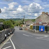 Turn left onto Bristol Road and use its right hand pavement.