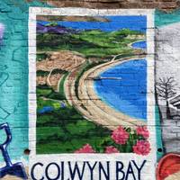 Don’t forget to stop and admire the murals along the walls of the railway bridge.
