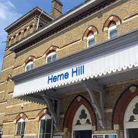 Your walk begins here at Herne Hill station. You’ll exit onto Railton Road.