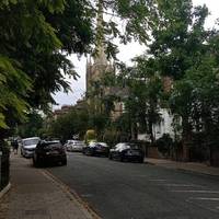 Cross to stay on Stockwell Park Road, from where St Michael's Church will be visible. Continue south towards the church.