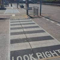 By the cycle hub, turn left to exit the bus station via four zebra crossings.