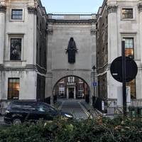 As you follow the outer path round the square you’ll pass No. 11 Cavendish Square with an interesting statue over the main arch.