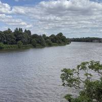 Walking over Chiswick Bridge to the view towards Barnes