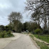 Head towards the end of the road and past the gates ahead to enter the park