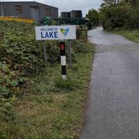 Follow the road, keeping an eye out for cars. There is also a layby here for parking.