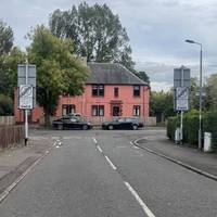 Walk to the end of the road, towards the red house. Then cross Station Road and turn left.