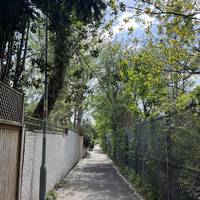 The footpath follows the railway line on the right.
