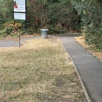 Turn right when the path reaches the bottom of the car park, by the sign for the Riding Centre.