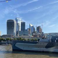 Continuing westwards, pass the HMS Belfast ship, a veteran of World War II and now open to the public.