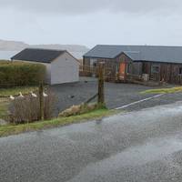 You’ll have far reaching views of loch Grehornish the cliffs of Creagan Dearga on the waternish peninsular and two modern wooden homes.