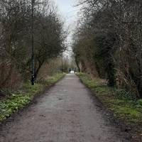 Begin by heading all the way down to a set of white gates on Mentmore Gardens. Follow the pathway until you reach a right hand turn.