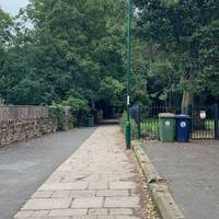 Continue to the left of the priory down the path with the graveyard on your right.