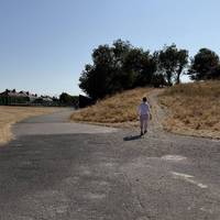 Head into the park and take the fork to the left. This will take you towards the tennis courts and play area.