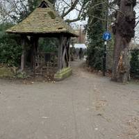 On the right is this church gate. Cross the road to enter the passageway.