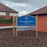 Go past the sign for the West Lancashire Golf Club.
