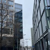 Continue walking ahead with the BBC building on your right.