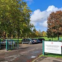 Start in the car park. Follow the yellow railings to the left in the picture onto grassy (sometimes muddy) path.