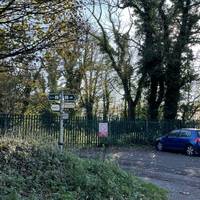 There’s a bridle way here and you’ll see this finger post signage at the junction. Turn right.