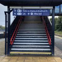 At the station, take the staircase or lift over the tracks, following the signs for trains to Shipley and Bradford. No ticket required.