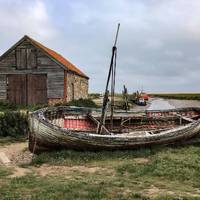 Turn right when you reach the road and head towards the old coal house.