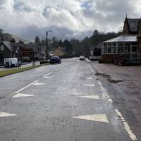 Walk down past the old hotel. Carefully cross the road when you reach the village shop and head straight on.