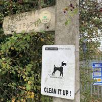 Shortly afterwards, look out for this sign on your left and continue on the John Ray Walk.