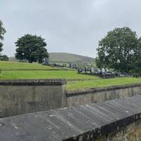 On the left you will pass Aughalane Cemetery.