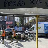 Exit the station and turn right onto Garratt Lane.