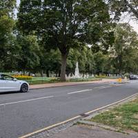 You'll see the War Memorial from the back, but don't cross, just continue walking straight with the road and river on your left hand side.