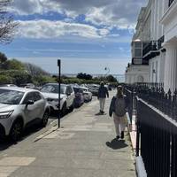 Turn right onto Sussex Square, heading towards the sea.