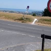 Cross the road in front of you and walk towards the Falklands Memorial Wood straight ahead