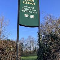Walk across the car park and take the shortcut to the road under the Queen Eleanor sign