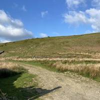 Immediately after passing the cattle grid you’ll see the remains of the TB hospital on the left.