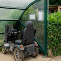 There are battery powered wheelchairs for use along the hard-surfaced path. Please talk to the Rangers for information about using these.