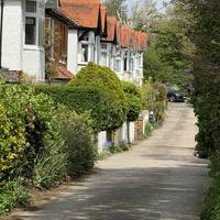 There are beautiful houses and streets all around the area.