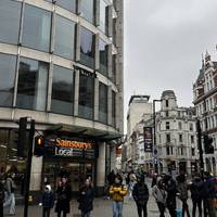 Pass with Sainsbury’s on your left, along High Holborn