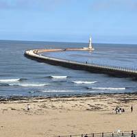 You'll spot Roker Lighthouse at the end of the pier.