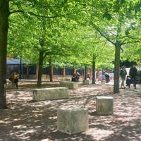 Walk through this little park. Plenty of places to sit and rest on seats or on the grass