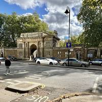 Cross the Old Brompton Road at the end of Kempsford Gardens. Turn left , then right under the archway into Brompton Cemetery.