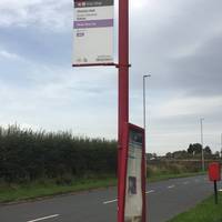 Walk past the Howley Hall bus stop after the turn onto the Howley Hall golf club.