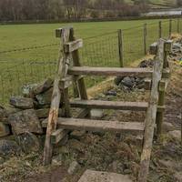 Head over the wooden stile.