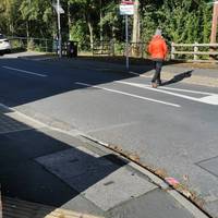 Turn left over ridged paving into Grosvenor Street and immediately cross it via the tactile dropped kerbs.