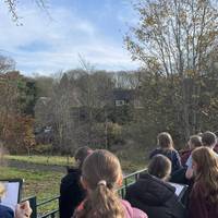 Walk past the Community Orchard on your left and walk forward.