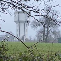 Head on the footpath with the meadow on your left. Water tower - you have now finished the hilly bit..