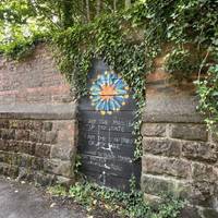 Look left for a painted picture mural on the wall. Can you see it?