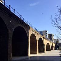 Coming out of Limehouse DLR, take a left and walk along the arches of the above DLR line. 