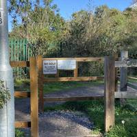 Soon you’ll come to a wooden barrier. Turn left to enter Stanlake Meadow.