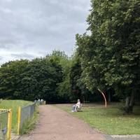 Continue past the playground on the left and the swings on the right.