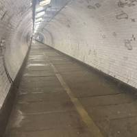 Head through the tunnel, it slopes either side so we head downhill initially. It’s wide and often busy so feels safe. It’s cool in summer.