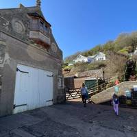 Cross the top of the slipway and head up the steps straight ahead - there is a handrail if you need it.